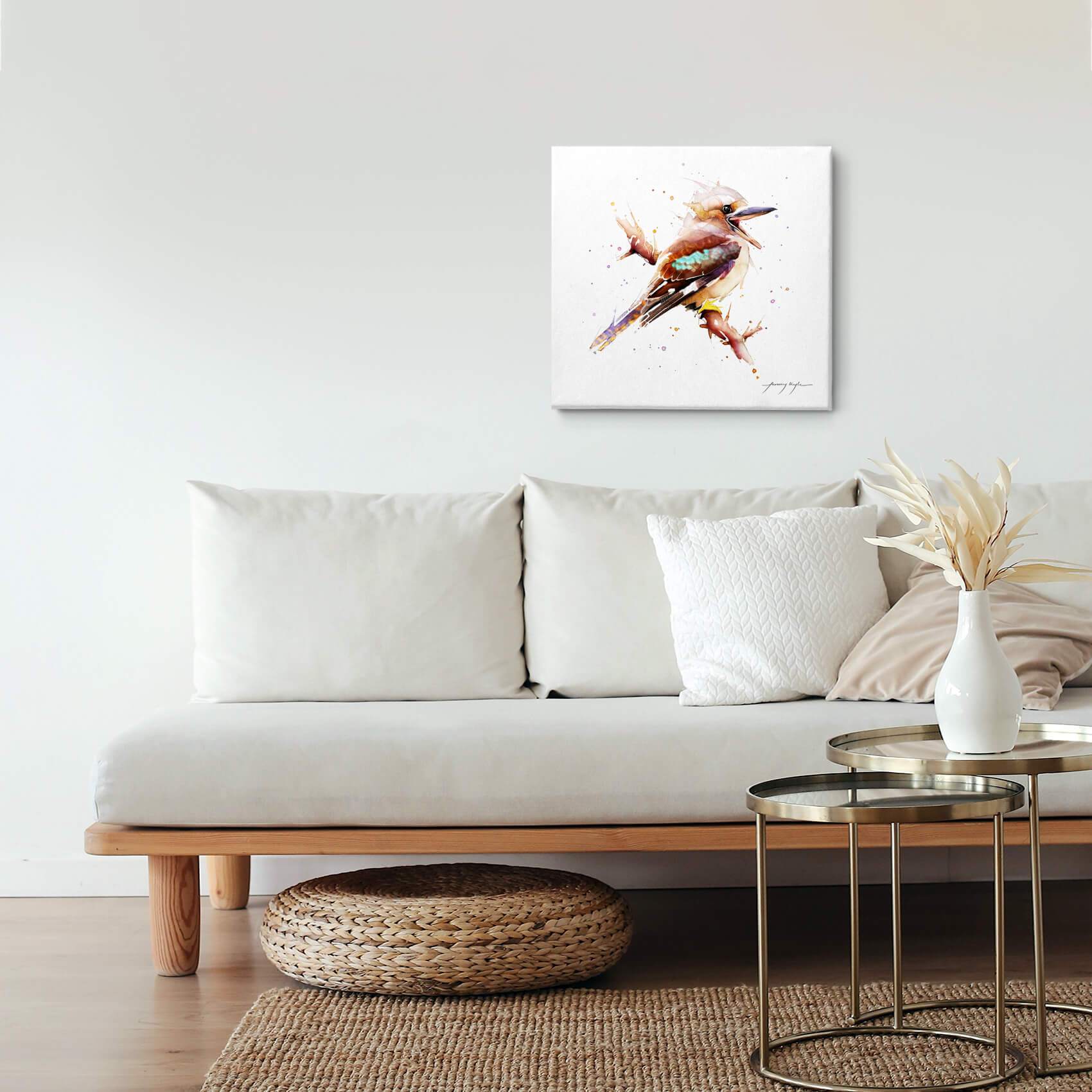 Kookaburra bird canvas wall art hanging in a living room.
